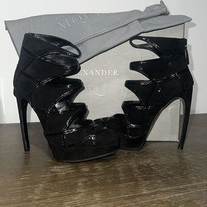 ALEXANDER McQUEEN black suede platform heels booties w/ cutouts. Includes box